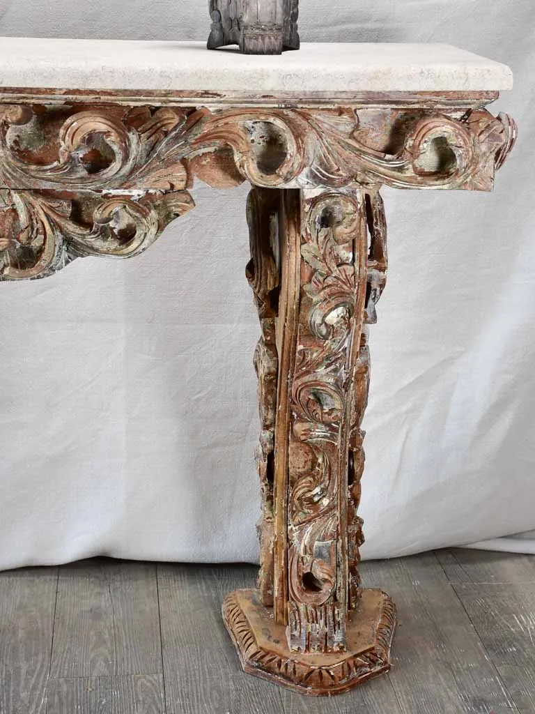 Magnificent carved console with travertine top 52" wide