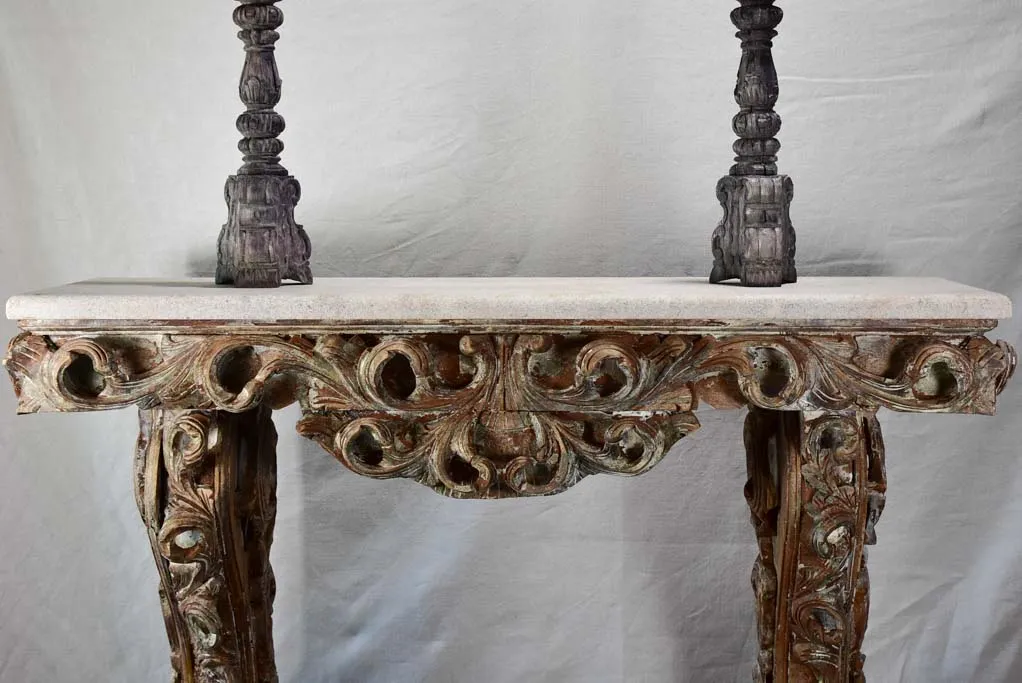 Magnificent carved console with travertine top 52" wide